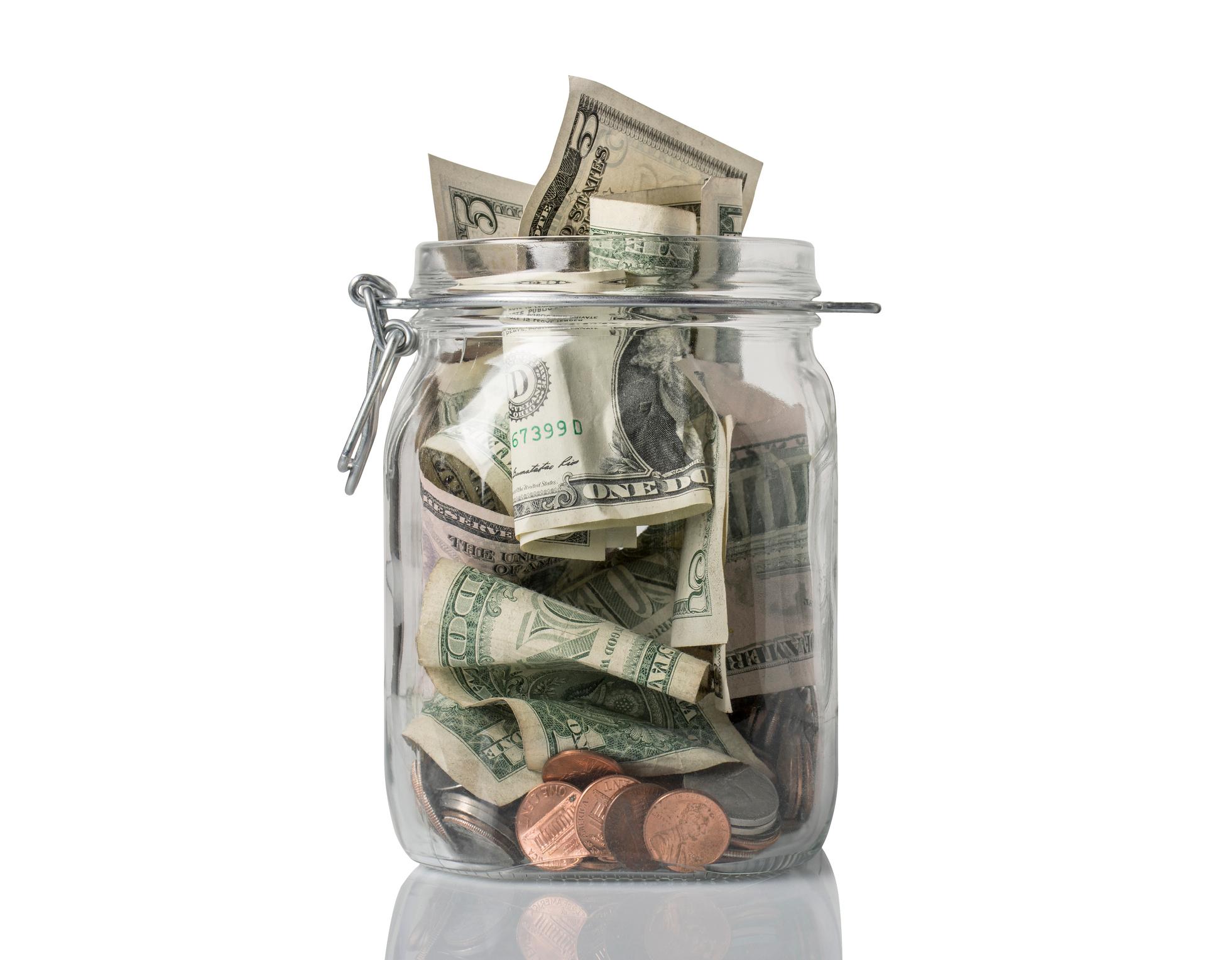 A closeup shot of a tip jar.